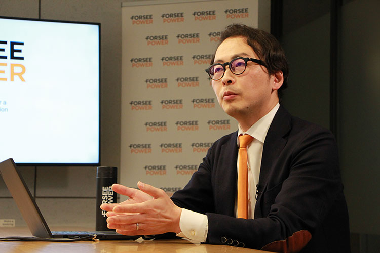 Kenjiro Azuma discussing future growth and prospects with passion