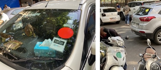 写真　ステッカーが貼付された車やバイク（ジェトロ撮影）